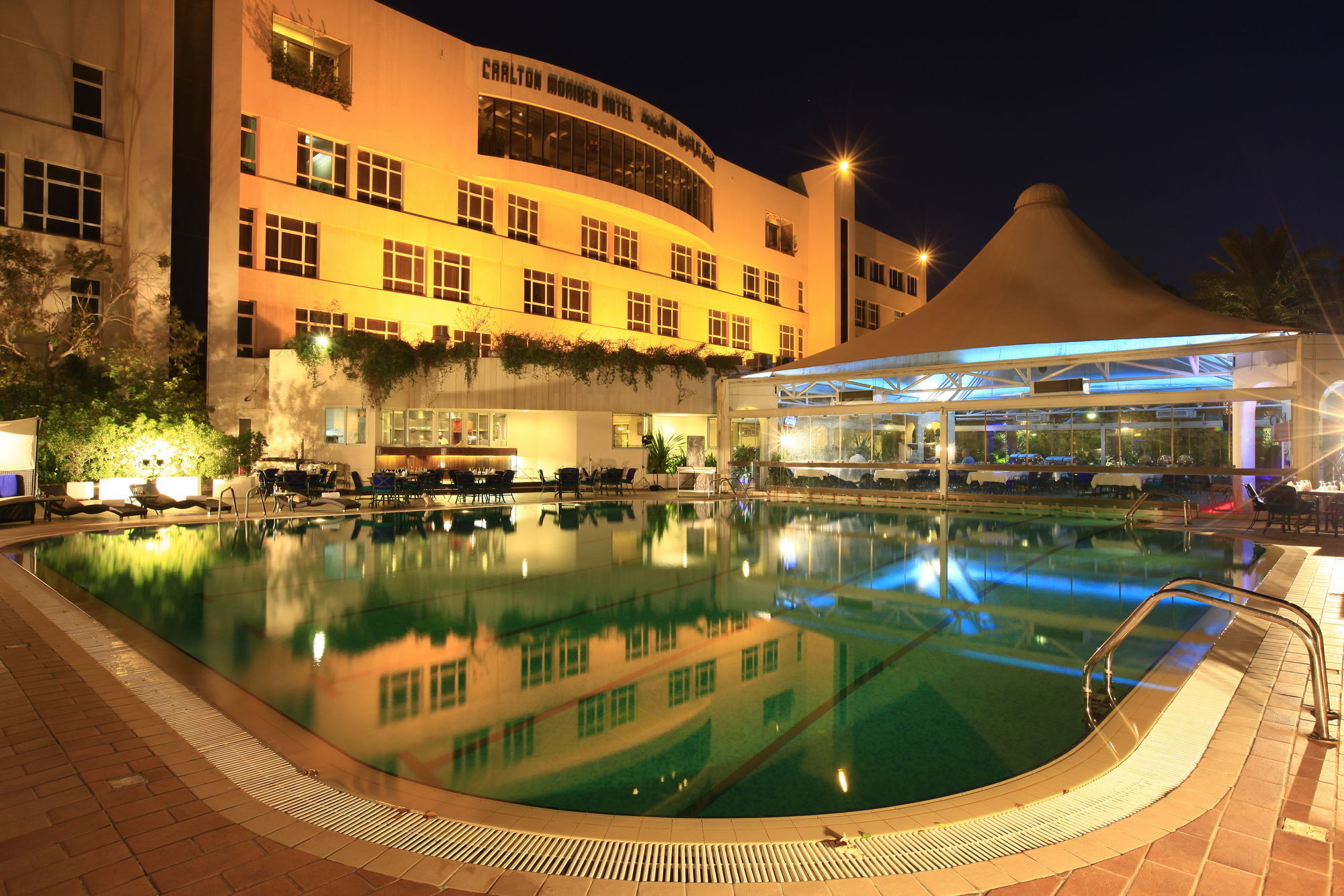 Carlton Al Moaibed Hotel Dammam Exterior foto The swimming pool at the hotel